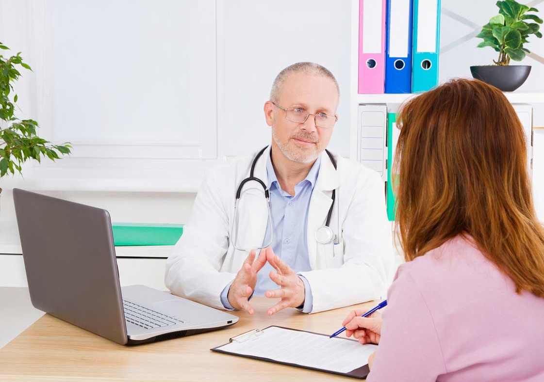 doctor patient discussing treatment options
